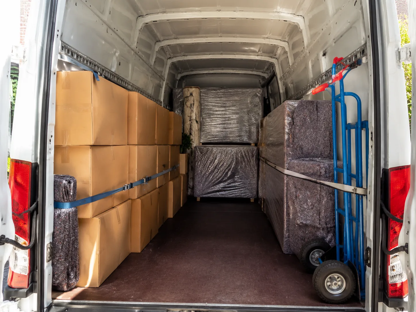 Furniture loaded carefully into a removals van